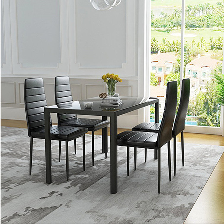 Glass dining table designs best sale 4 seater